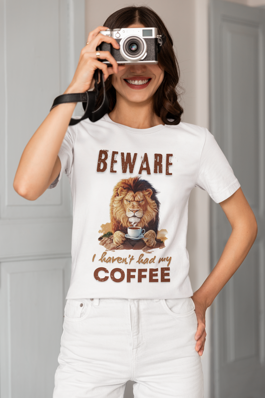 Grumpy Lion ‘Beware, I Haven’t Had My Coffee’ Unisex Cotton Tee – Cozy & Fiercely Fun!